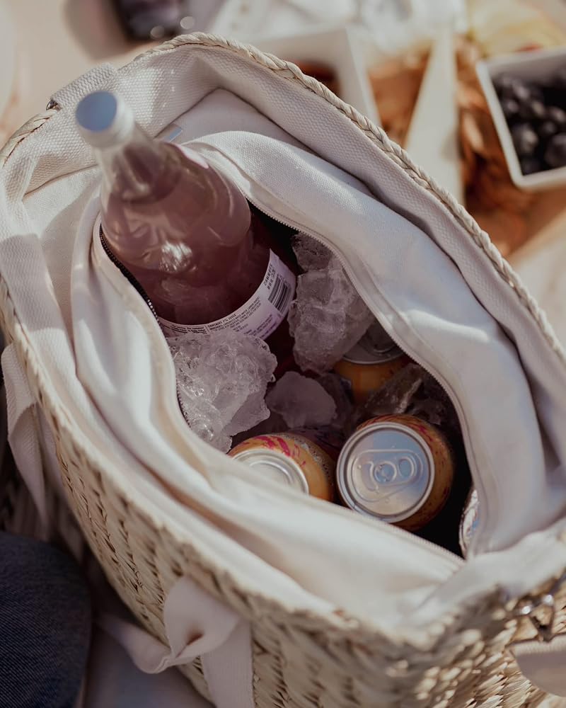 Loose ice, cans and a bottle inside the bag's waterproof cooler liner
